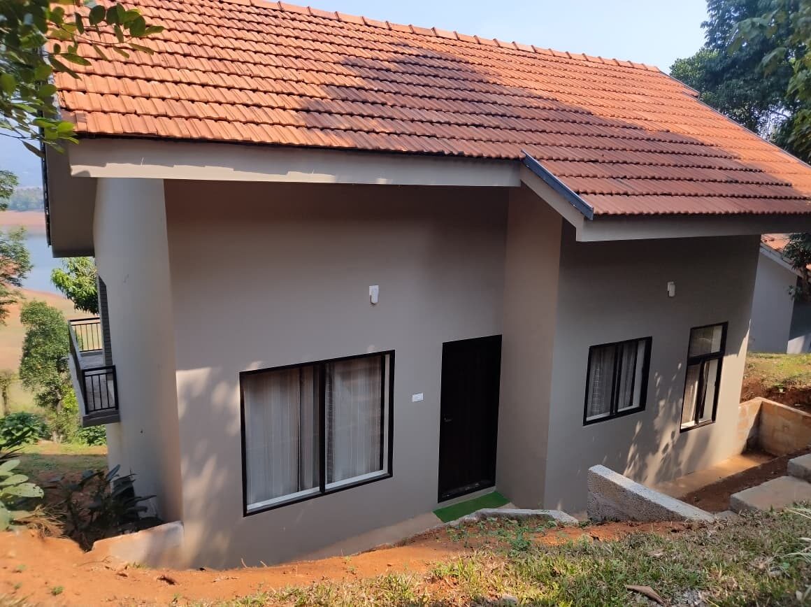 Standard two bedroom villa exterior at Seagot Banasura Resorts
